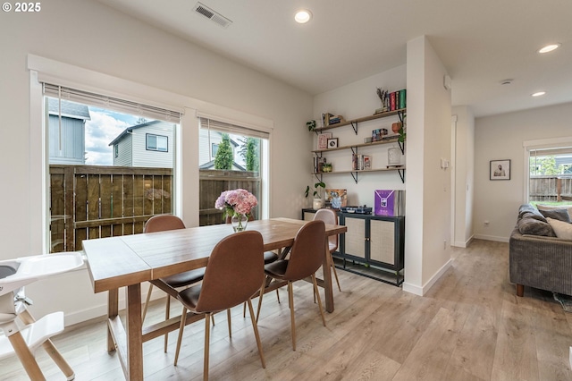 11492 SE Mt Talbert Ave, Happy Valley, OR 97086 - dining area featuring light wood finished floors, recessed lighting, and baseboards