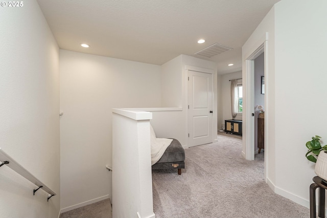 11492 SE Mt Talbert Ave, Happy Valley, OR 97086 - hall featuring an upstairs landing, light colored carpet, recessed lighting, and baseboards