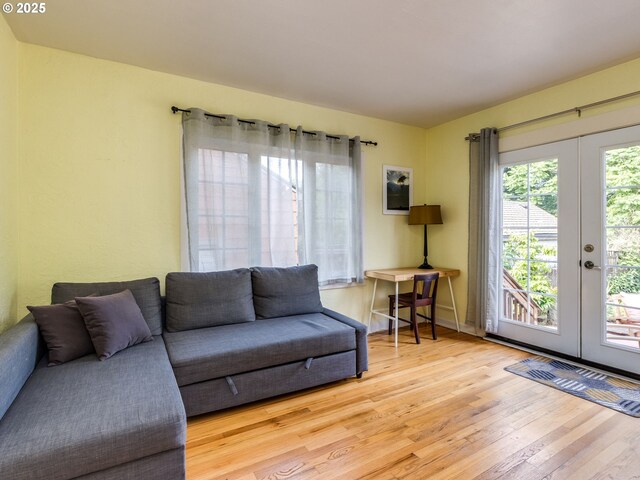 1405 NE 47th Ave, Portland, OR 97213 - living area featuring french doors and wood finished floors