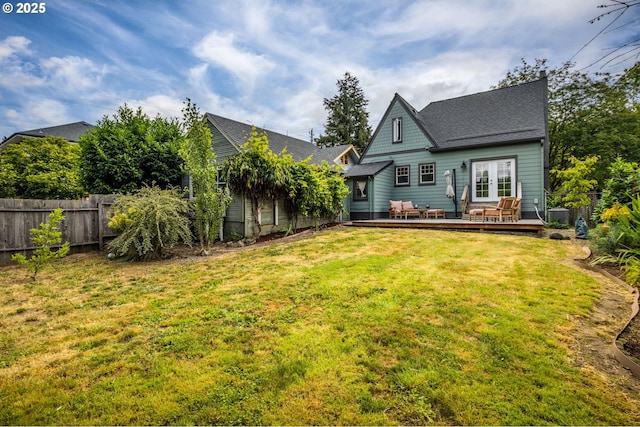 1405 NE 47th Ave, Portland, OR 97213 - back of property with a deck, a fenced backyard, and french doors