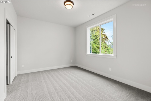 empty room with light carpet