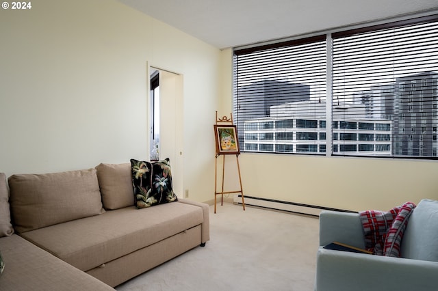 living room featuring carpet floors and baseboard heating