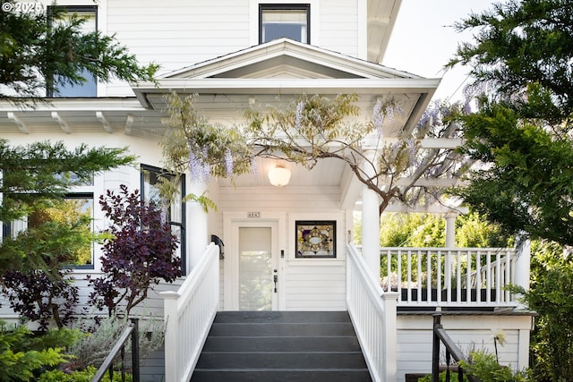 entrance to property with a porch