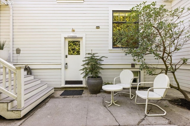 doorway to property with a patio