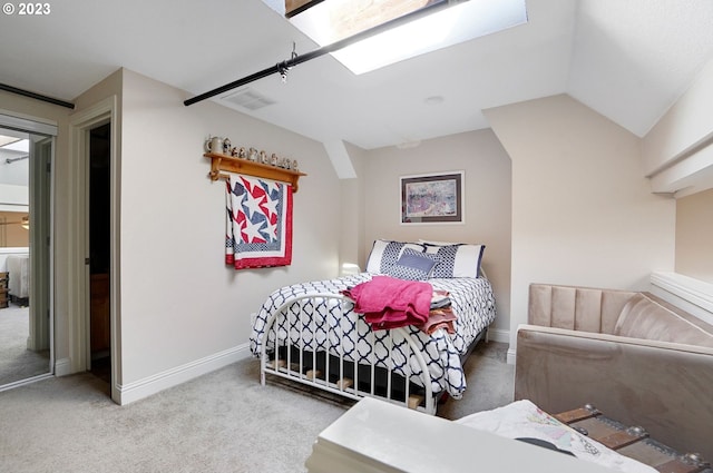 bedroom with lofted ceiling and carpet flooring