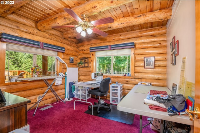 home office with ceiling fan, wood ceiling, beamed ceiling, and rustic walls