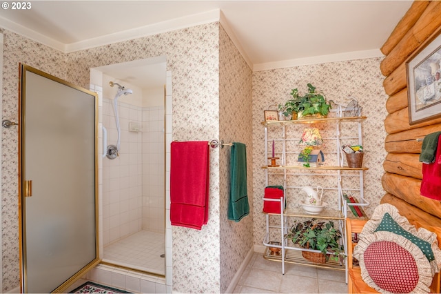 bathroom with ornamental molding, tile flooring, and walk in shower