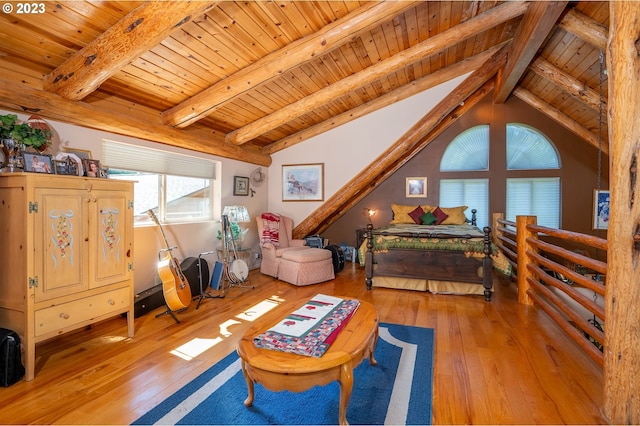 interior space featuring light hardwood / wood-style flooring, lofted ceiling with beams, and wood ceiling