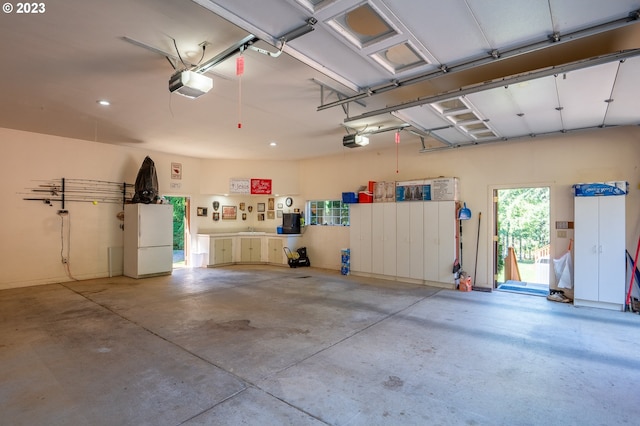 garage featuring a garage door opener