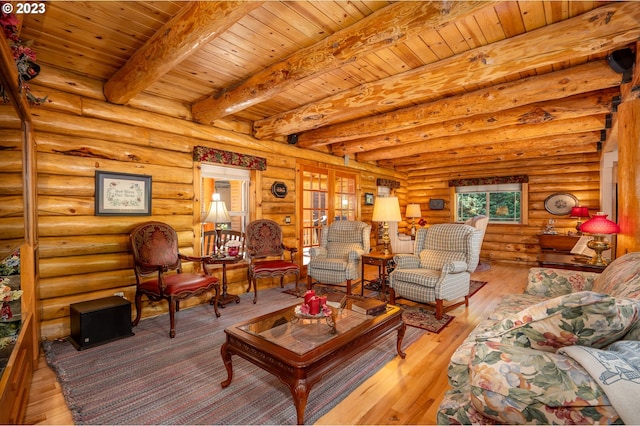 living room with wood ceiling, beamed ceiling, log walls, and light hardwood / wood-style flooring