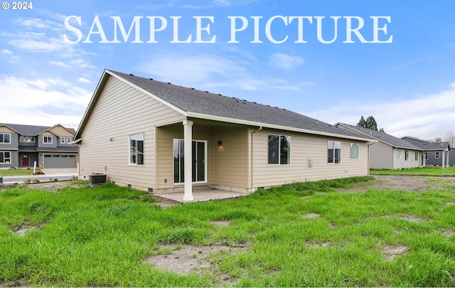 rear view of house featuring central AC unit and a patio area