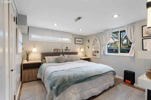 bedroom featuring wood-type flooring