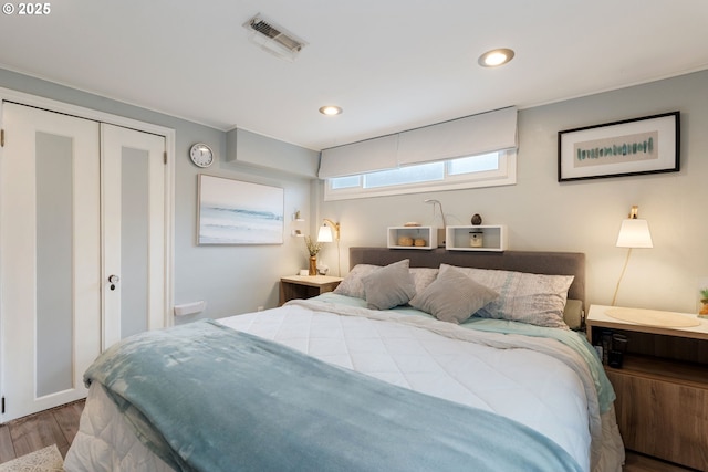 bedroom featuring wood-type flooring