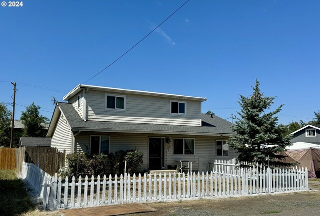 view of front of home with a lawn