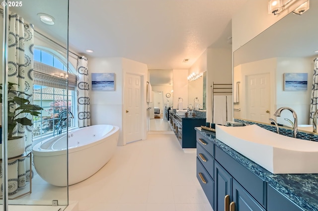 17472 NW Gilbert Ln, Portland, OR 97229 - bathroom with a freestanding tub, vanity, recessed lighting, and a shower with shower curtain