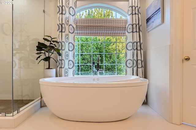 17472 NW Gilbert Ln, Portland, OR 97229 - bathroom featuring a shower stall and a soaking tub