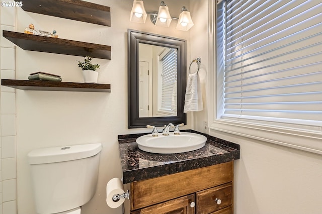 17472 NW Gilbert Ln, Portland, OR 97229 - bathroom featuring vanity, toilet, and plenty of natural light