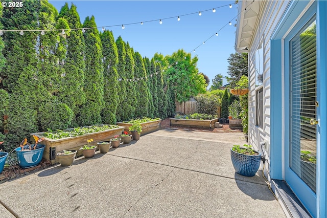 17472 NW Gilbert Ln, Portland, OR 97229 - view of patio with a vegetable garden