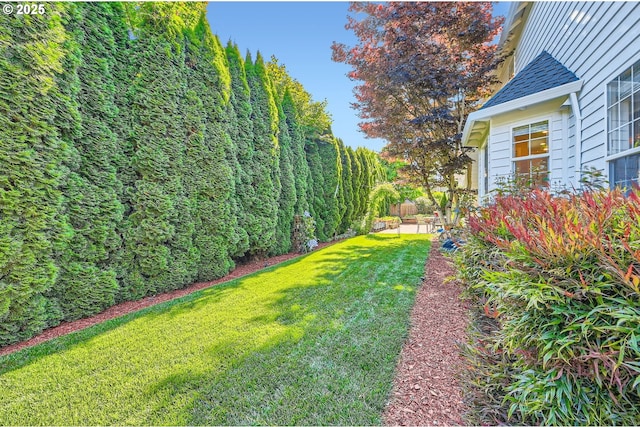17472 NW Gilbert Ln, Portland, OR 97229 - view of grassy yard featuring a patio area