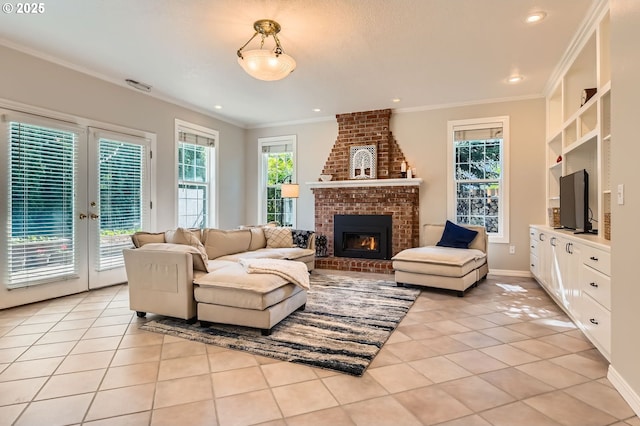 17472 NW Gilbert Ln, Portland, OR 97229 - living room featuring light tile patterned floors, a brick fireplace, crown molding, french doors, and baseboards