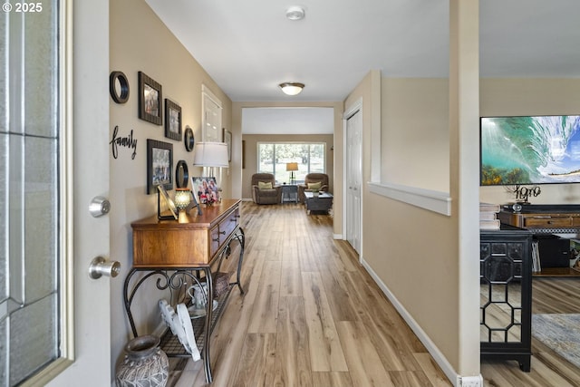 2057 SE Blue Skies Ln, Prineville, OR 97754 - corridor featuring wood finished floors and baseboards