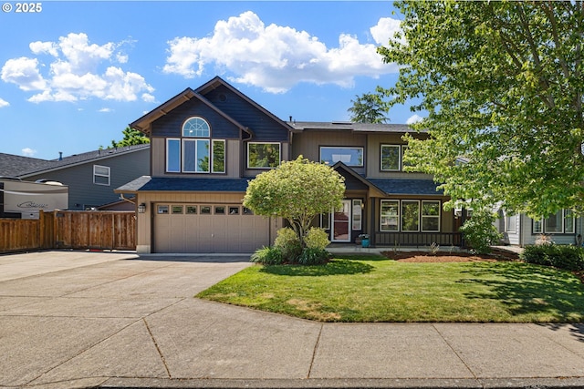 traditional-style home with driveway and an attached garage