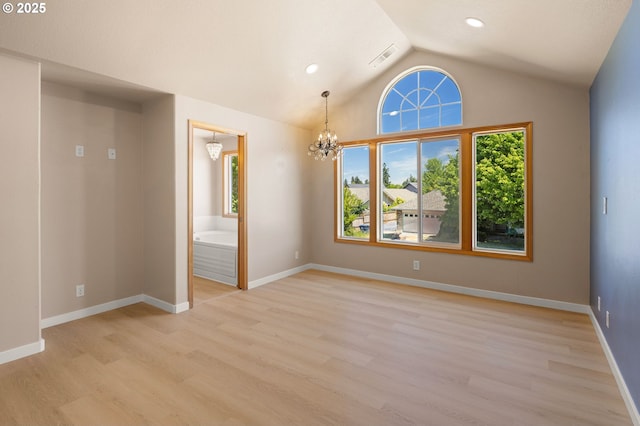 empty room with light wood-style flooring, vaulted ceiling, a chandelier, baseboards, and recessed lighting