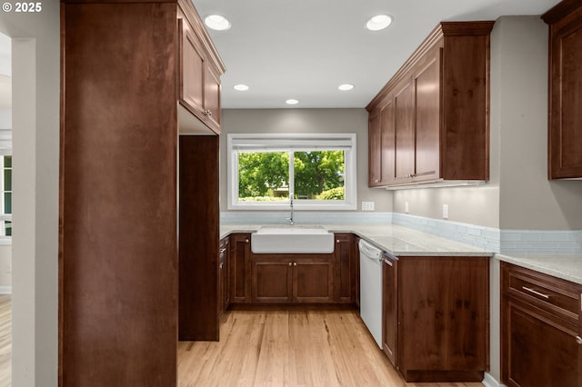 6105 NE 18th Ave, Portland, OR 97211 - kitchen with light wood finished floors, dishwashing machine, light stone countertops, and recessed lighting