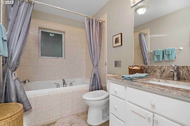 full bathroom featuring oversized vanity, toilet, and shower / tub combo