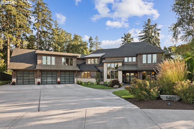 view of front of property with a garage