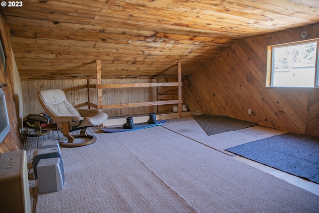 additional living space featuring wooden ceiling, wood walls, and vaulted ceiling