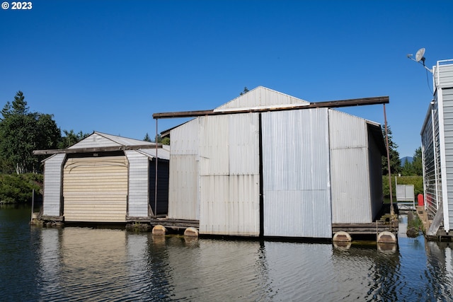 exterior space with a water view