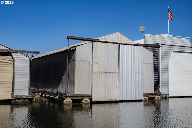 exterior space with a water view