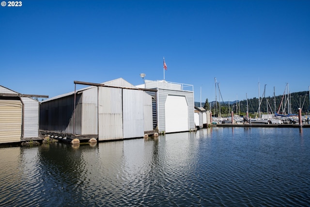 dock area with a water view