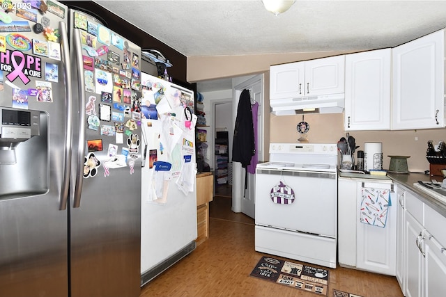 kitchen featuring white electric stove, stainless steel fridge, light hardwood / wood-style floors, lofted ceiling, and white cabinetry