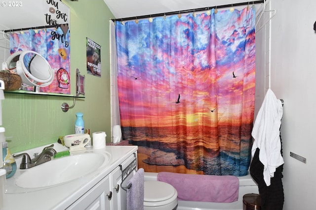 full bathroom featuring shower / tub combo, toilet, and vanity