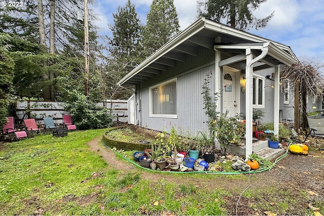 view of home's exterior featuring a lawn