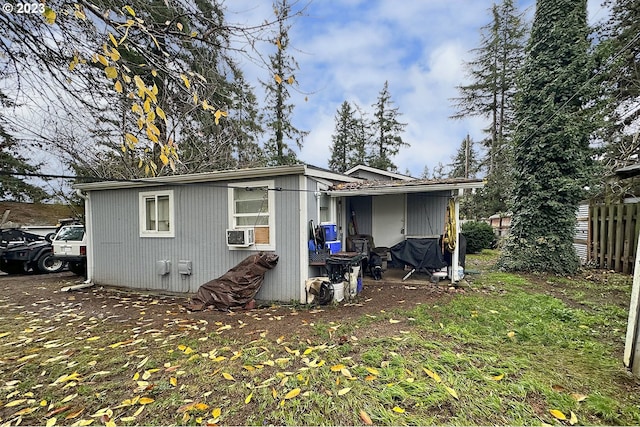 back of property with cooling unit