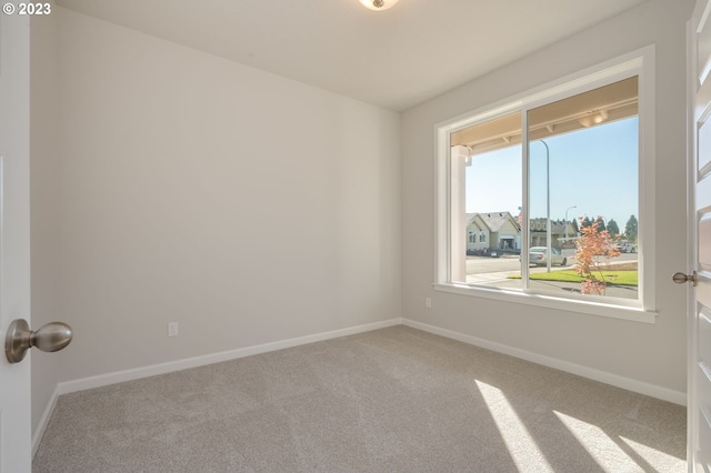 view of carpeted spare room