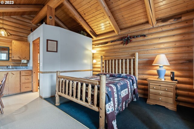 363 S Mill St, Sumpter, OR 97877 - carpeted bedroom with rustic walls, vaulted ceiling with beams, wood ceiling, and sink