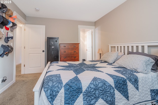 carpeted bedroom with baseboards