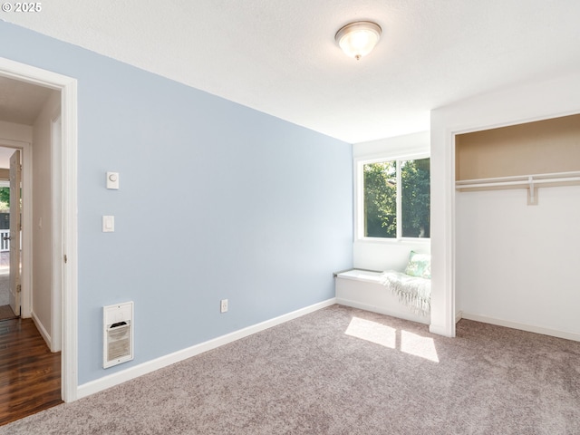 10204 NE 6th Ave, Vancouver, WA 98685 - unfurnished bedroom with heating unit, a closet, and carpet flooring