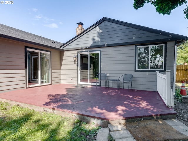 10204 NE 6th Ave, Vancouver, WA 98685 - rear view of property with a wooden deck and a chimney