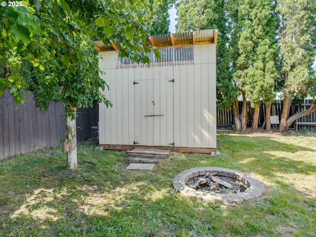10204 NE 6th Ave, Vancouver, WA 98685 - view of shed featuring an outdoor fire pit and a fenced backyard