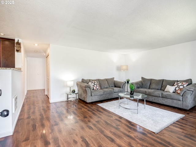 10204 NE 6th Ave, Vancouver, WA 98685 - living room featuring wood finished floors, a textured ceiling, and recessed lighting