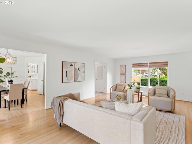 1209 Lake Garden Ct, Lake Oswego, OR 97034 - living room featuring light wood finished floors and a chandelier