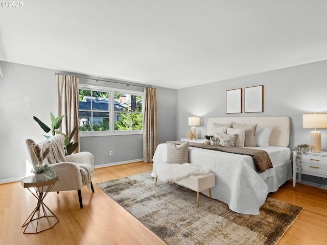 1209 Lake Garden Ct, Lake Oswego, OR 97034 - bedroom featuring light wood-type flooring and baseboards