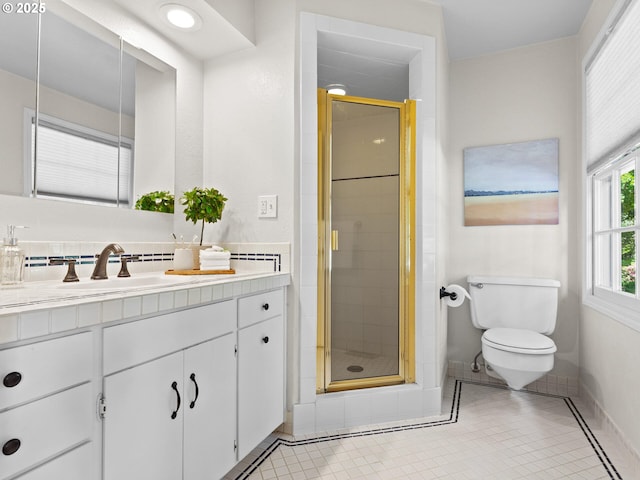 1209 Lake Garden Ct, Lake Oswego, OR 97034 - bathroom with vanity, toilet, a stall shower, tile patterned floors, and baseboards