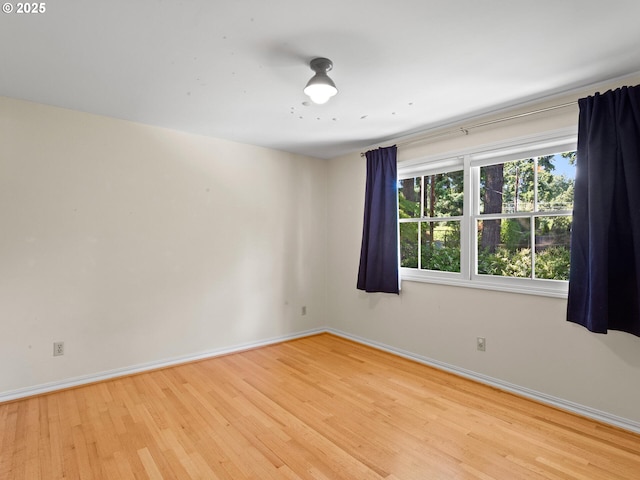 1209 Lake Garden Ct, Lake Oswego, OR 97034 - empty room featuring baseboards and wood finished floors