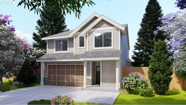 view of front of property featuring a front yard and a garage